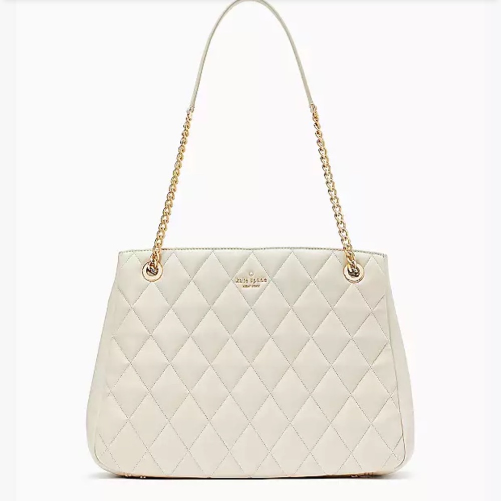Kate Spade Carey Tote 
COLOR:
Parchment
NWT